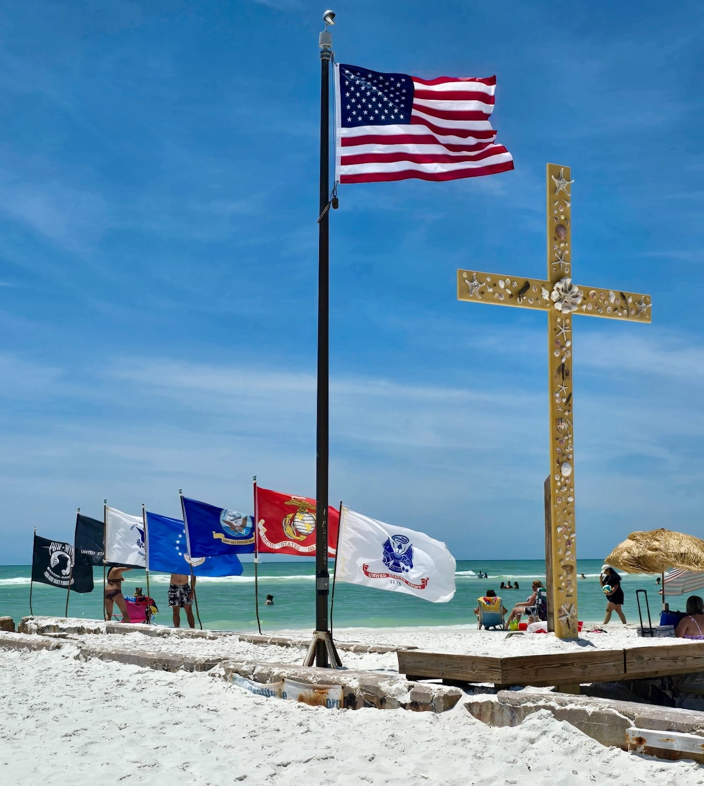 American flag and seashell cross on a St. Pete beach